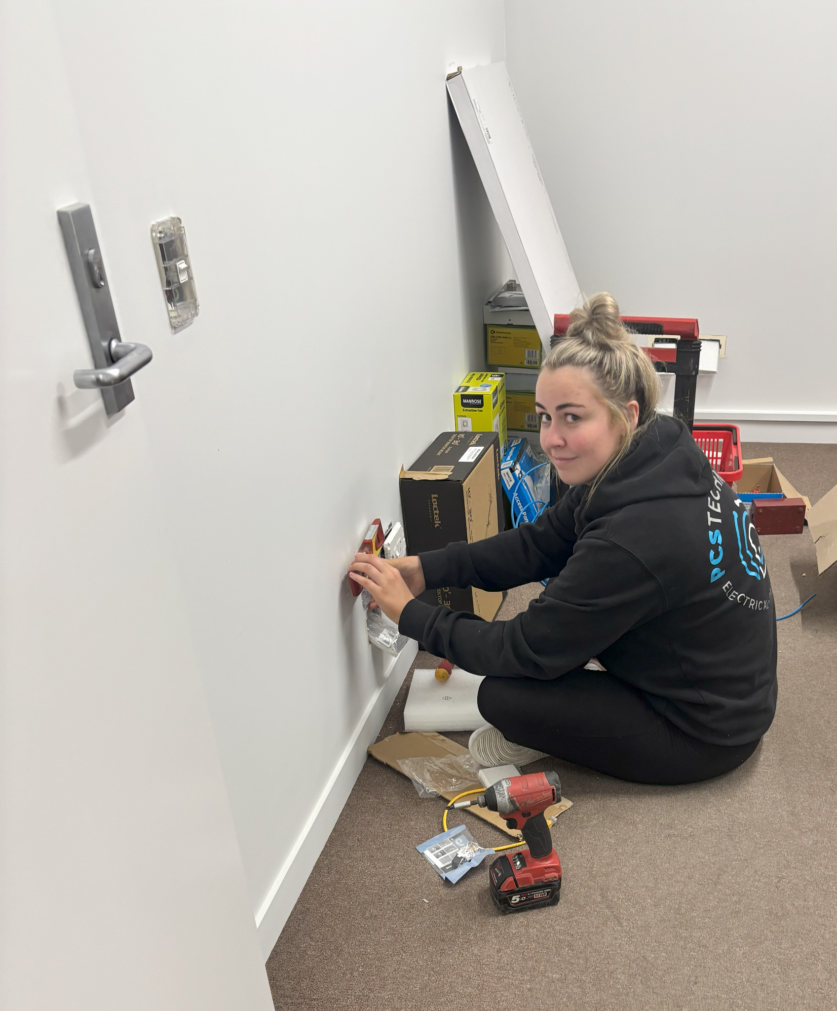 Apprentice fitting data & comms outlets